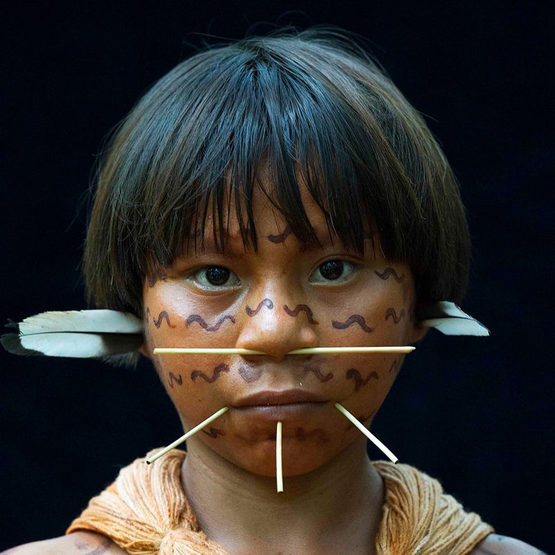 meeeting with Yanomami girl with traditional facial painting and piercings